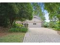 Front view of charming house with brick driveway at 3474 Castleridge Dr, Tucker, GA 30084