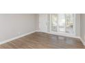 Bright living room with hardwood floors and large windows at 2072 Clairmont Ter, Atlanta, GA 30345