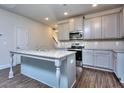 Modern kitchen with stainless steel appliances and light gray cabinets at 6186 Ripple Way # 84, South Fulton, GA 30349