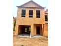 New construction townhome exterior with a two-car garage at 6186 Ripple Way # 84, South Fulton, GA 30349
