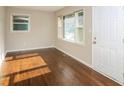 Bright living room with hardwood floors and large windows at 3523 Se Garfield Se Way, Atlanta, GA 30354