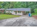 Ranch house with carport and spacious yard at 700 Symphony Nw Ln, Atlanta, GA 30318