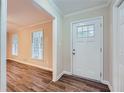 Bright entryway with hardwood floors and access to living room at 1123 Redan Way, Stone Mountain, GA 30088