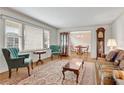 Spacious living room features hardwood floors, large windows, and ample seating at 3216 Guynelle Dr, Marietta, GA 30066