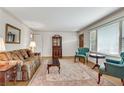 Bright living room with hardwood floors, comfortable seating, and natural light at 3216 Guynelle Dr, Marietta, GA 30066