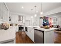 Modern kitchen with white cabinets and stainless steel appliances at 58 Peachtree Memorial Nw Dr # 1, Atlanta, GA 30309