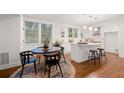 Bright dining area with round table and four chairs at 58 Peachtree Memorial Nw Dr # 1, Atlanta, GA 30309