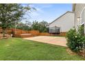 Large backyard with a patio, deck, and trampoline at 4732 Moccasin Ct, Douglasville, GA 30135