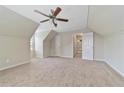 Large bonus room featuring a ceiling fan and access to other rooms at 1870 Rocksram Dr, Buford, GA 30519