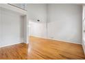 Spacious living room featuring hardwood floors and a fireplace at 341 Glen Cove Dr, Avondale Estates, GA 30002