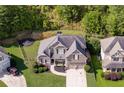 Two-story home with two-car garage and tree-filled backyard at 200 Pine Trl, Dallas, GA 30157