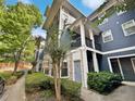 Three-story building with blue siding and stone accents at 1575 Ridenour Nw Pkwy # 804, Kennesaw, GA 30152
