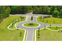 Overhead view of a circular roadway and landscaped area at 8599 Seabiscuit Rd, Lithonia, GA 30058