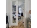 Bright bedroom with a queen-size bed and hardwood floors at 727 Cascade Sw Ave, Atlanta, GA 30310