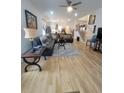 Spacious living room with hardwood floors and sectional sofa at 727 Cascade Sw Ave, Atlanta, GA 30310