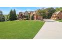 Brick house with large lawn and detached garage at 2145 Jones Phillips Rd, Dacula, GA 30019