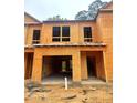 Unfinished townhouse exterior with exposed framing at 6202 Ripple Way # 88, South Fulton, GA 30349