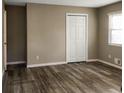 Spacious bedroom featuring wood-look flooring and a double door closet at 2900 Bradmoor Ct, Decatur, GA 30034