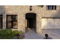 Stone house entrance with arched doorway at 3778 Wynn Walk, Brookhaven, GA 30341