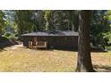 House exterior with deck and wooded area at 2069 Woodberry Ave, East Point, GA 30344