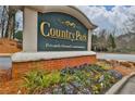 Country Park Privately Owned Condominiums entrance sign with landscaping at , Smyrna, GA 30080