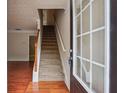 Bright entryway with hardwood floors and staircase at 4029 Riverside Pkwy, Decatur, GA 30034