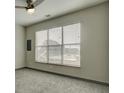 Bright bedroom with ceiling fan and large window at 238 Walker Sw St # 32, Atlanta, GA 30313