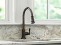 Close-up of a kitchen sink with a modern bronze faucet at 2701 Southwell St, Atlanta, GA 30305