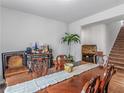 Spacious dining room with large wood table and hutch at 719 Sara Meadow Rd, Loganville, GA 30052