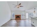 Living room with hardwood floors and fireplace at 4069 High Country Dr, Douglasville, GA 30135