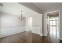 Formal dining room with hardwood floors and chandelier at 2656 Staunton Ln, Duluth, GA 30096