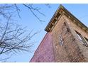 Close-up view of brick building exterior with unique architectural details at 330 Peters Sw St # 210, Atlanta, GA 30313