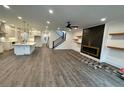 Open living space featuring a fireplace and built-in shelving at 1985 Saint Johns Sw Pl, Atlanta, GA 30315