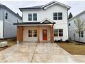 Two-story house with modern farmhouse exterior at 1985 Saint Johns Sw Pl, Atlanta, GA 30315
