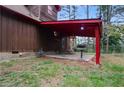 Small covered patio with grill at 6945 Butner Rd, Atlanta, GA 30349