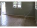 Bright living room with tile floors and neutral walls at 2585 Westchester Dr, Atlanta, GA 30344