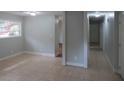 Open living area with tile floors and hallway access at 2585 Westchester Dr, Atlanta, GA 30344