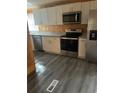 Modern kitchen with stainless steel appliances at 3600 Grady Smith Rd, Loganville, GA 30052