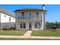 Front view of a charming two-story house with gray accents at 6001 Stallion Rdg, Douglasville, GA 30135