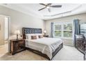 Spacious main bedroom with ample natural light and plush carpet at 2617 Jupiter Sw Dr, Powder Springs, GA 30127