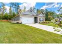 One story home with stone and siding exterior at 426 Samara Ct, Fairburn, GA 30213