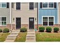 Three-unit townhouse building with gray and blue siding at 4433 Pinscher St, Union City, GA 30291