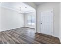 Dining room with hardwood floors and natural light at 6019 Wheeler Ridge Rd, Auburn, GA 30011
