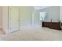 Spacious office with built-in desk and ample natural light at 9620 Cedar Grove Rd, Chattahoochee Hills, GA 30213