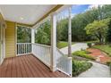 Front porch view of the home's entrance and landscaping at 178 Seals Dr, Dallas, GA 30157