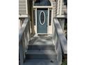 Inviting front door entry with decorative glass and a welcoming porch at 13 Cliff Ct, Villa Rica, GA 30180