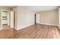 Living room with light neutral walls and hardwood flooring at 2354 Woodhill Ln, Atlanta, GA 30344
