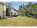 Tan two-story building with stone accents and landscaping at 1468 Briarwood Rd # 805, Brookhaven, GA 30319