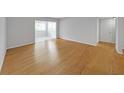 Living room with hardwood floors and neutral walls at 1468 Briarwood Rd # 805, Brookhaven, GA 30319