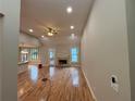 Spacious living room with hardwood floors, a fireplace, and recessed lighting at 5544 Whispering Swan Ct, Douglasville, GA 30135